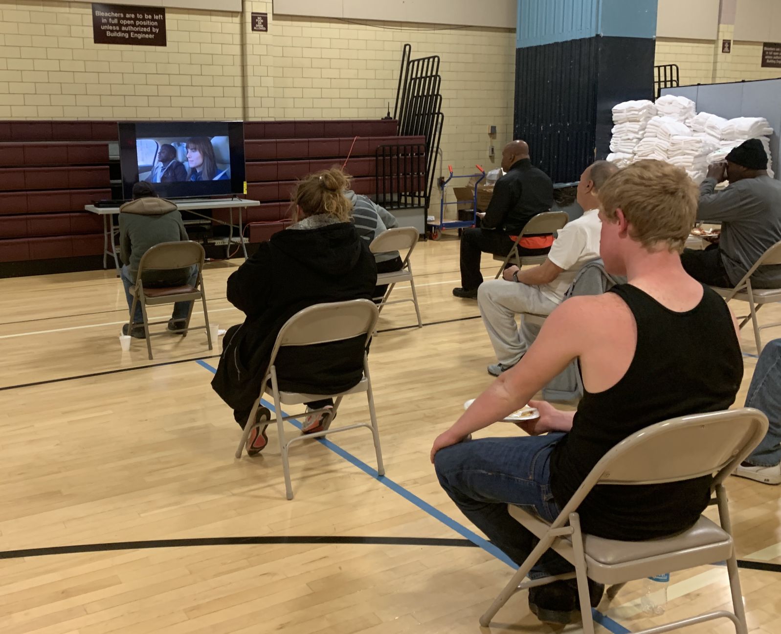 Photo_News_HomelessCovid_TVWatching.jpg